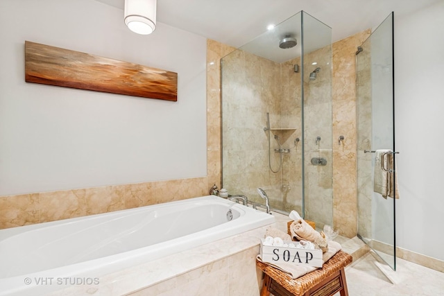 full bath featuring a shower stall and a bath