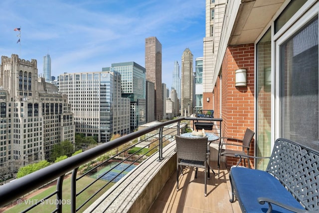 balcony featuring a city view