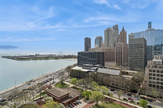 exterior space with a water view and a view of city