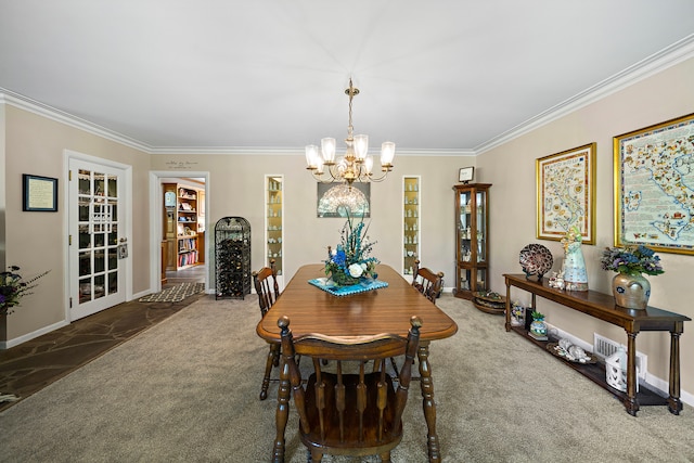 dining space with a chandelier, crown molding, carpet floors, and baseboards