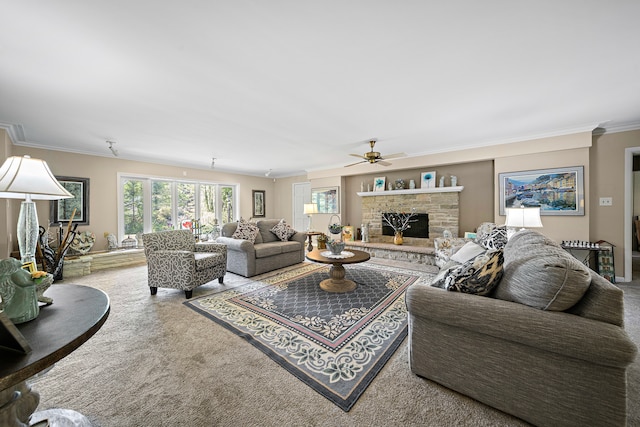 living area with a fireplace, ceiling fan, ornamental molding, and carpet floors