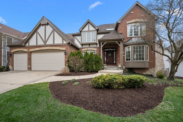 1651 Eagle Brook Dr, Geneva, IL 60134 - tudor home featuring brick siding, an attached garage, and concrete driveway