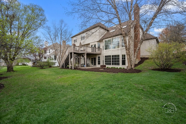 1651 Eagle Brook Dr, Geneva, IL 60134 - back of property with a patio area, a lawn, a chimney, a deck, and stairs