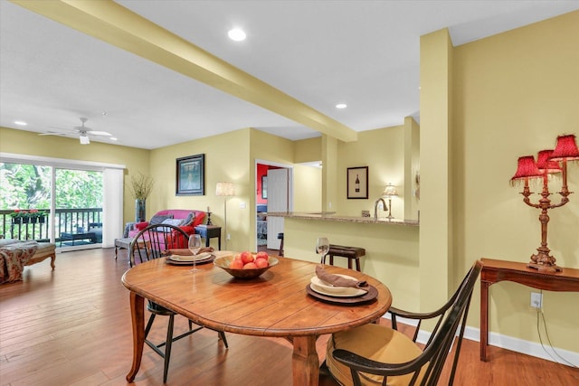 dining room featuring ceiling fan, recessed lighting, and wood finished floors