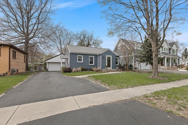 418 Bonnie Brae Ave, Itasca, IL 60143 - view of front of property featuring a residential view, a detached garage, a chimney, and a front yard