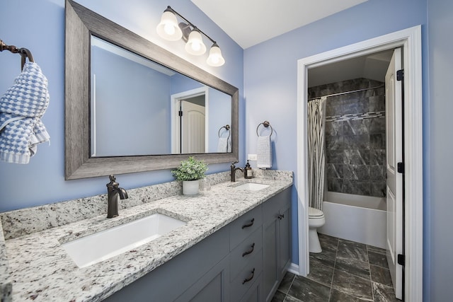 bathroom featuring toilet, shower / bath combo with shower curtain, a sink, and double vanity
