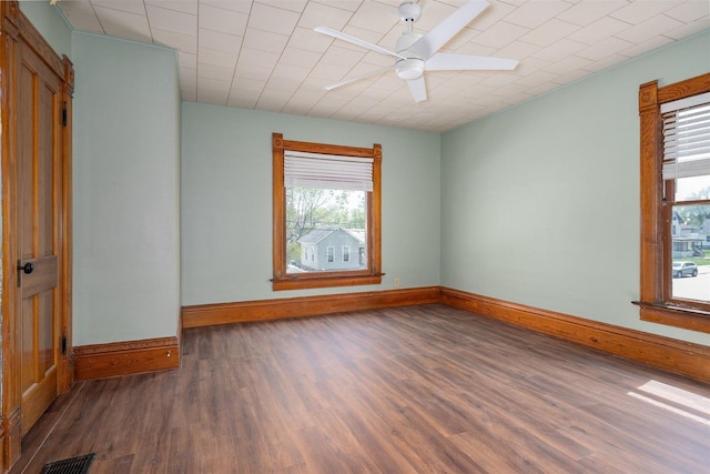 765 N Main St, Pontiac, IL 61764 - spare room featuring baseboards, visible vents, wood finished floors, and ceiling fan