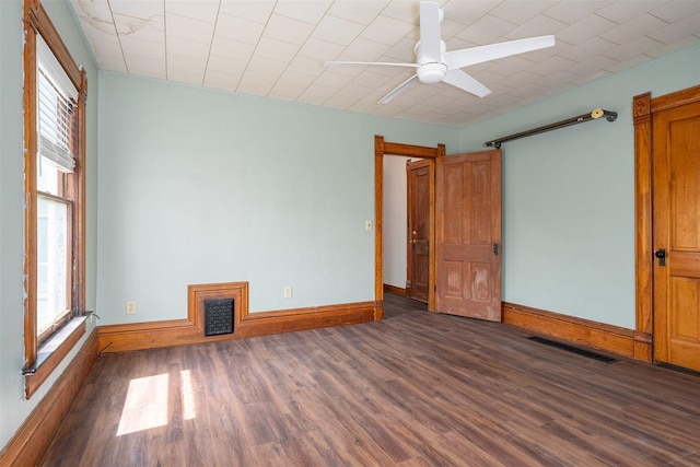 765 N Main St, Pontiac, IL 61764 - empty room with visible vents, wood finished floors, and plenty of natural light