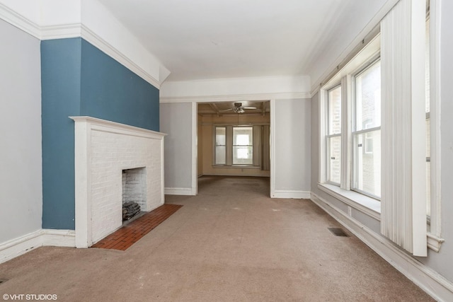 5433 S Carpenter St, Chicago, IL 60609 - unfurnished living room featuring carpet, a ceiling fan, and a brick fireplace