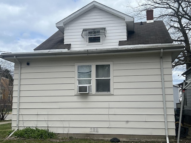 1702 Lincoln St, North Chicago, IL 60064 - view of side of home with a shingled roof and a chimney