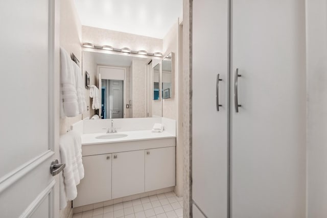 bathroom with vanity and tile patterned flooring