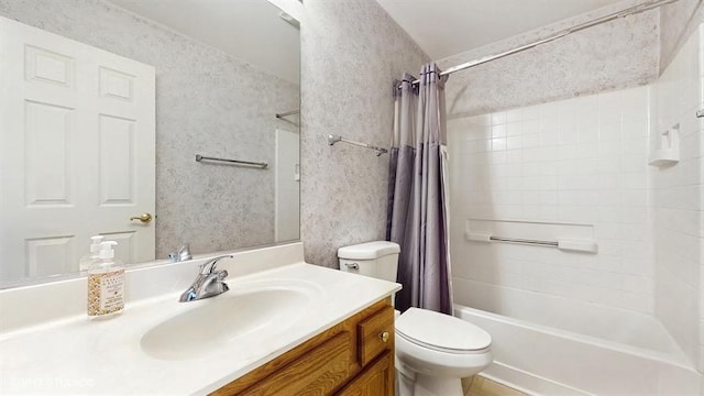 bathroom with shower / tub combo, vanity, and toilet