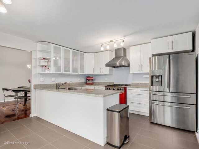 dining area featuring baseboards and wood finished floors