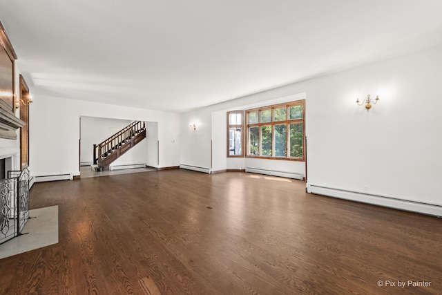 109 3rd Ave, Montgomery, IL 60538 - unfurnished living room with a baseboard heating unit, a baseboard radiator, dark wood finished floors, and a fireplace with flush hearth