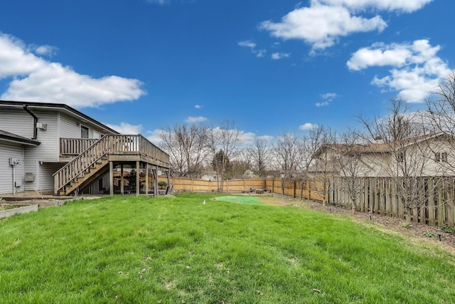 view of yard featuring stairs and a deck