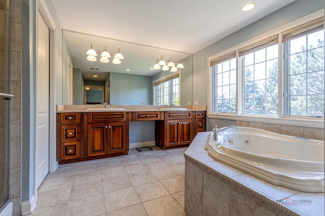 full bathroom featuring a whirlpool tub, an enclosed shower, and vanity