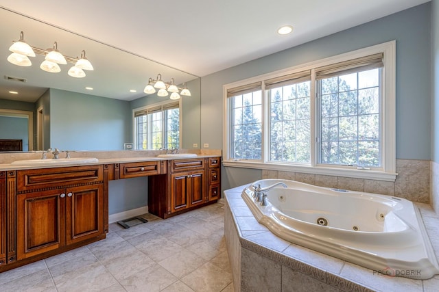 full bath with visible vents, a sink, double vanity, and a tub with jets