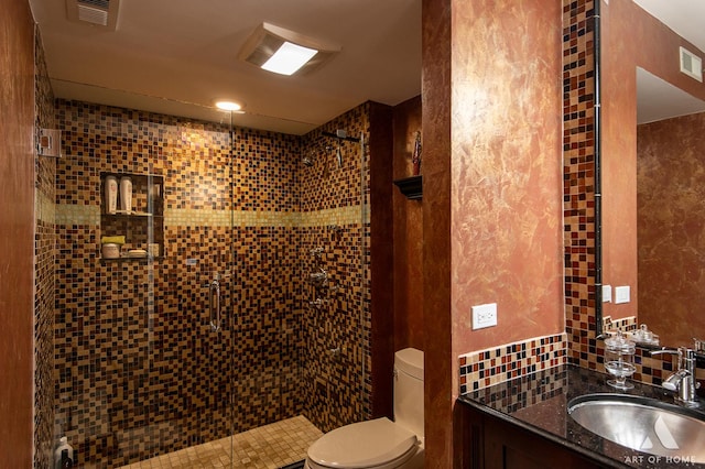 11012 S Theresa Cir Unit 3C, Palos Hills, IL 60465 - bathroom featuring visible vents, toilet, a stall shower, and vanity