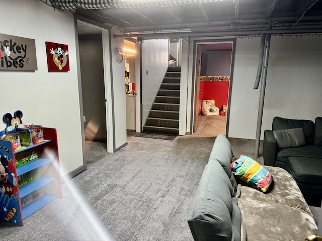 finished below grade area with stairway and carpet floors