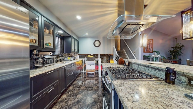 8129 45th Pl, Lyons, IL 60534 - kitchen featuring light stone counters, island range hood, a sink, glass insert cabinets, and appliances with stainless steel finishes