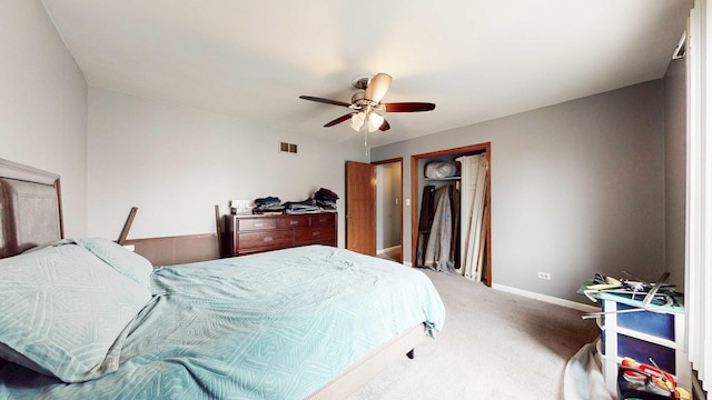 8129 45th Pl, Lyons, IL 60534 - carpeted bedroom with a closet, visible vents, baseboards, and ceiling fan