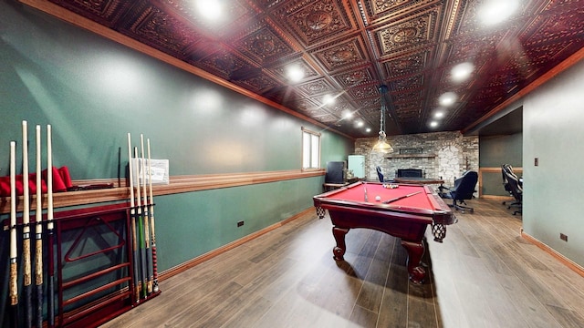 8129 45th Pl, Lyons, IL 60534 - playroom with a stone fireplace, wood finished floors, an ornate ceiling, pool table, and baseboards