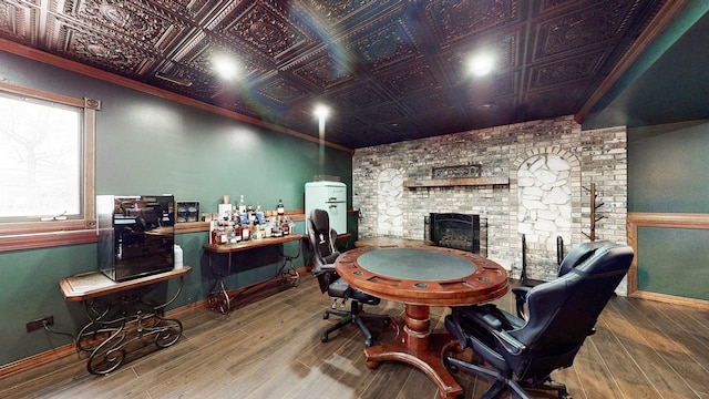 8129 45th Pl, Lyons, IL 60534 - home office with hardwood / wood-style flooring, baseboards, a large fireplace, and an ornate ceiling