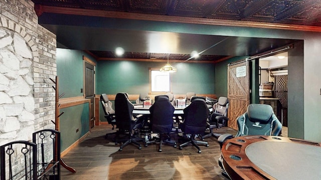 8129 45th Pl, Lyons, IL 60534 - office featuring a barn door, baseboards, and wood finished floors