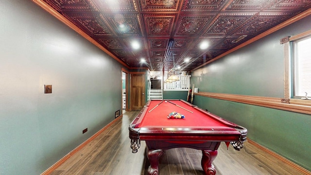 8129 45th Pl, Lyons, IL 60534 - recreation room with baseboards, an ornate ceiling, and wood finished floors