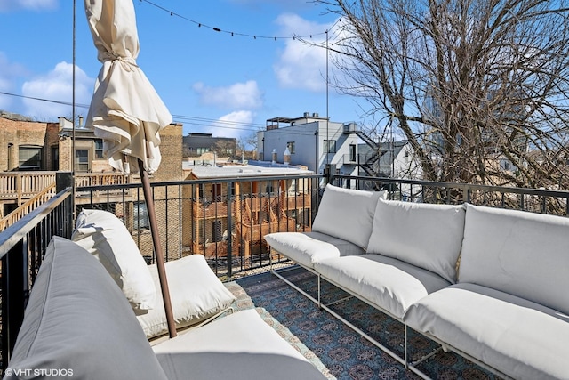 exterior space with an outdoor living space and a residential view