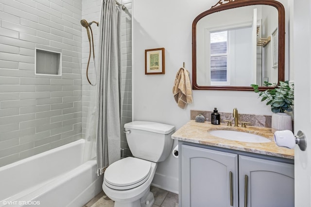 full bath with vanity, shower / bath combo with shower curtain, and toilet