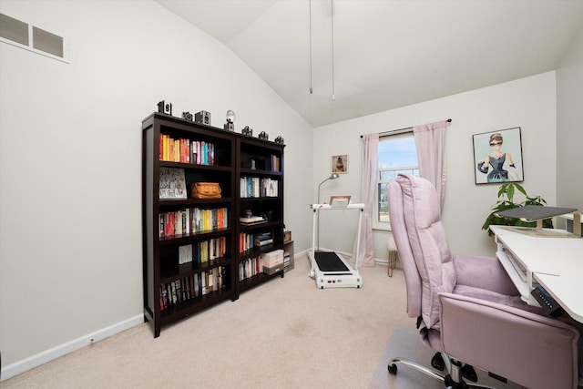 office space with light carpet, vaulted ceiling, visible vents, and baseboards