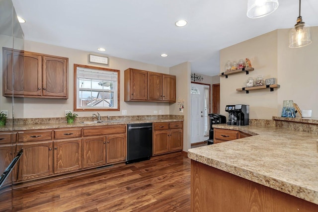 1035 Heritage Dr, Diamond, IL 60416 - kitchen with brown cabinetry, dishwashing machine, dark wood-style floors, a sink, and decorative light fixtures