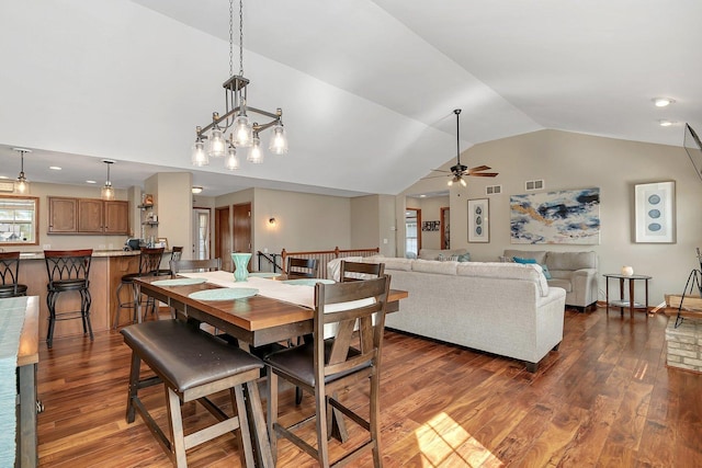 1035 Heritage Dr, Diamond, IL 60416 - dining space featuring visible vents, a ceiling fan, vaulted ceiling, and dark wood-type flooring