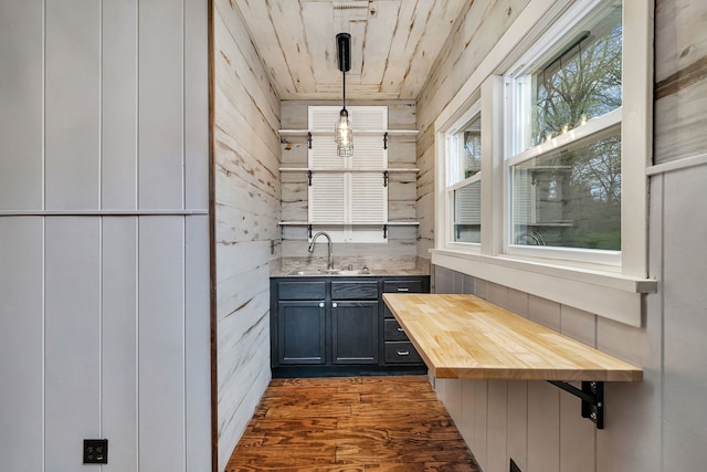 112 W 1st St, Streator, IL 61364 - bar featuring wooden walls, a sink, wooden ceiling, and dark wood-type flooring