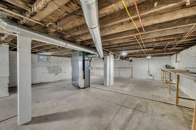 112 W 1st St, Streator, IL 61364 - unfinished below grade area with heating unit