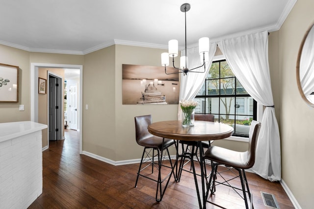 113 Welwyn St Unit 0, Lake Bluff, IL 60044 - dining room featuring a chandelier, dark wood-style floors, baseboards, and ornamental molding