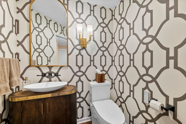 113 Welwyn St Unit 0, Lake Bluff, IL 60044 - bathroom with wallpapered walls, toilet, and vanity