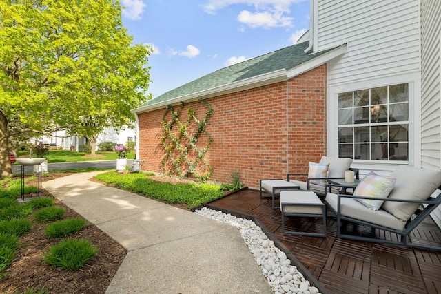 113 Welwyn St Unit 0, Lake Bluff, IL 60044 - view of side of home with brick siding and roof with shingles