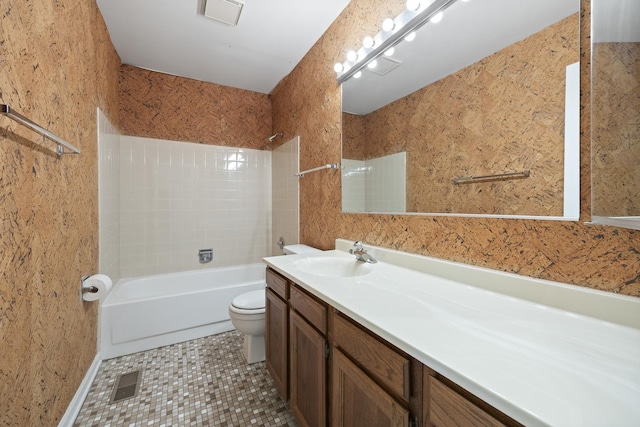 full bath featuring tile patterned flooring, visible vents, toilet, vanity, and  shower combination