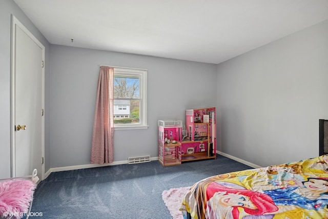 bedroom featuring baseboards, visible vents, and carpet