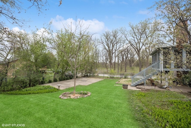 view of yard with stairs