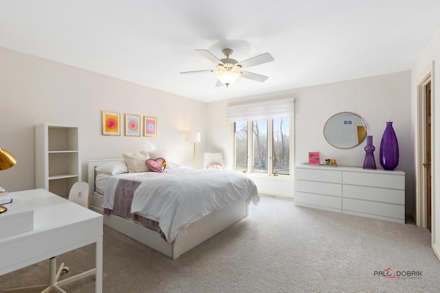 bedroom with carpet floors and a ceiling fan