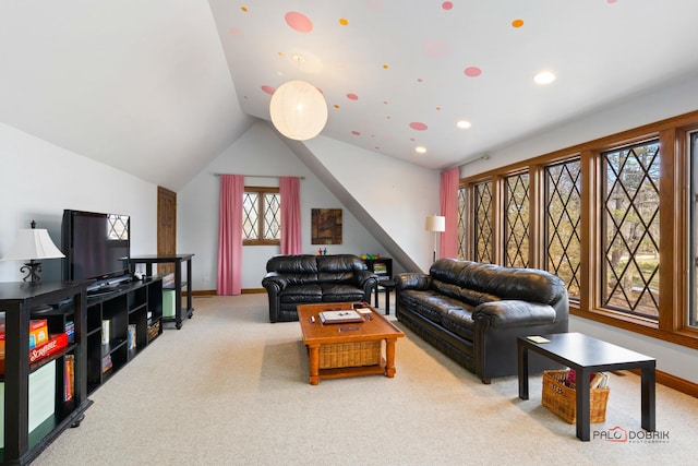 living area with baseboards, vaulted ceiling, and carpet