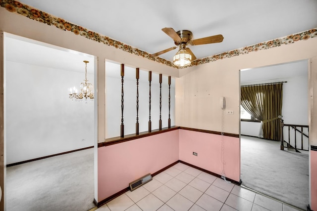 16157 Ozark Ave, Tinley Park, IL 60477 - empty room featuring ceiling fan with notable chandelier, light carpet, and baseboards