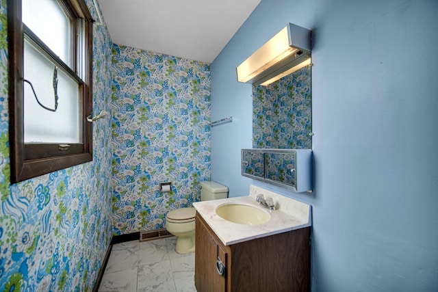 16157 Ozark Ave, Tinley Park, IL 60477 - bathroom featuring wallpapered walls, visible vents, vanity, and toilet