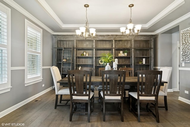 32 E Peter Ln, Hawthorn Woods, IL 60047 - dining space with a chandelier, wood finished floors, a raised ceiling, and crown molding