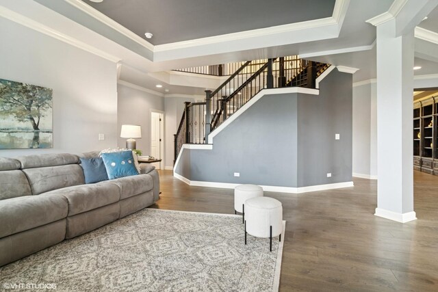 32 E Peter Ln, Hawthorn Woods, IL 60047 - living room featuring wood finished floors, stairway, ornamental molding, a raised ceiling, and recessed lighting