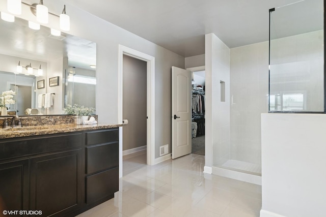 32 E Peter Ln, Hawthorn Woods, IL 60047 - full bathroom featuring a walk in shower, vanity, a walk in closet, and tile patterned floors