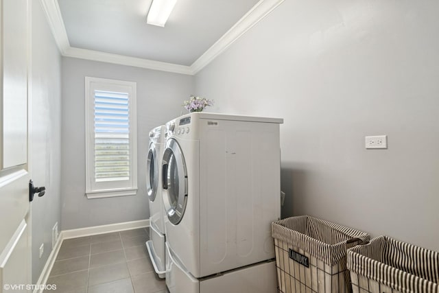 32 E Peter Ln, Hawthorn Woods, IL 60047 - laundry room featuring washing machine and dryer, ornamental molding, and tile patterned flooring